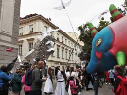 Parade performance with larger-than-life puppets