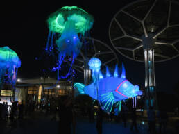luminous puppets of jellyfish and fish